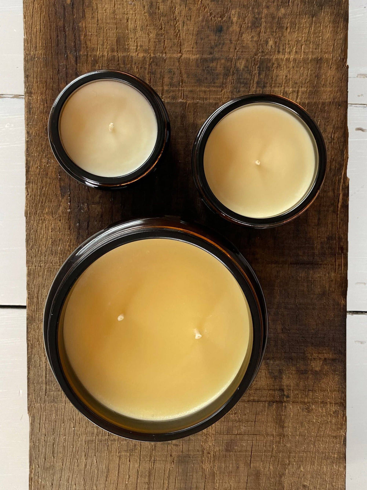 Natural essential oil candle with orange and cinnamon spices
