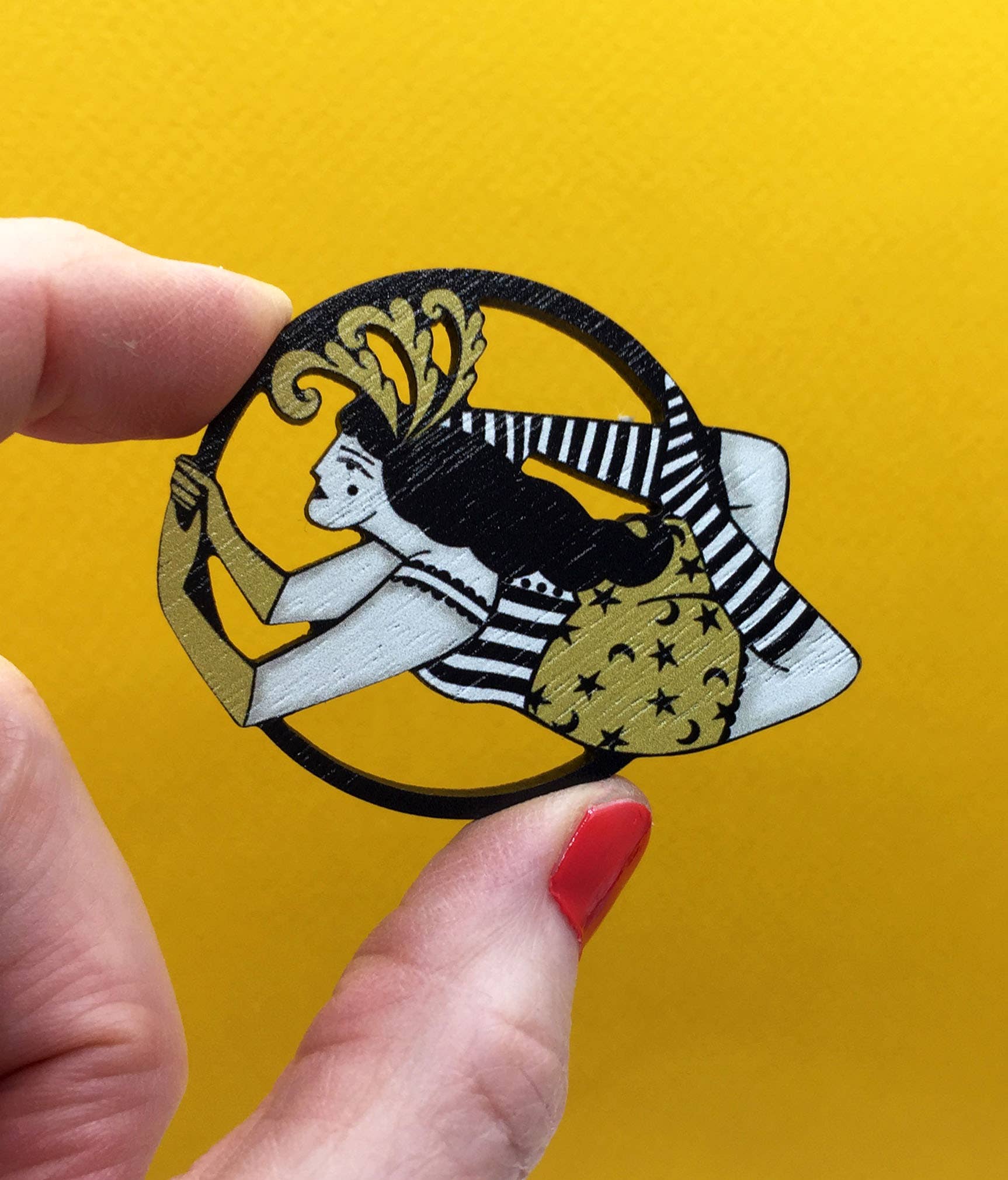 Vintage style wooden circus aerialist pin brooch with feather headdress from Night Circus collection by Su Owen, made from sustainable walnut wood, lasercut in the UK.
