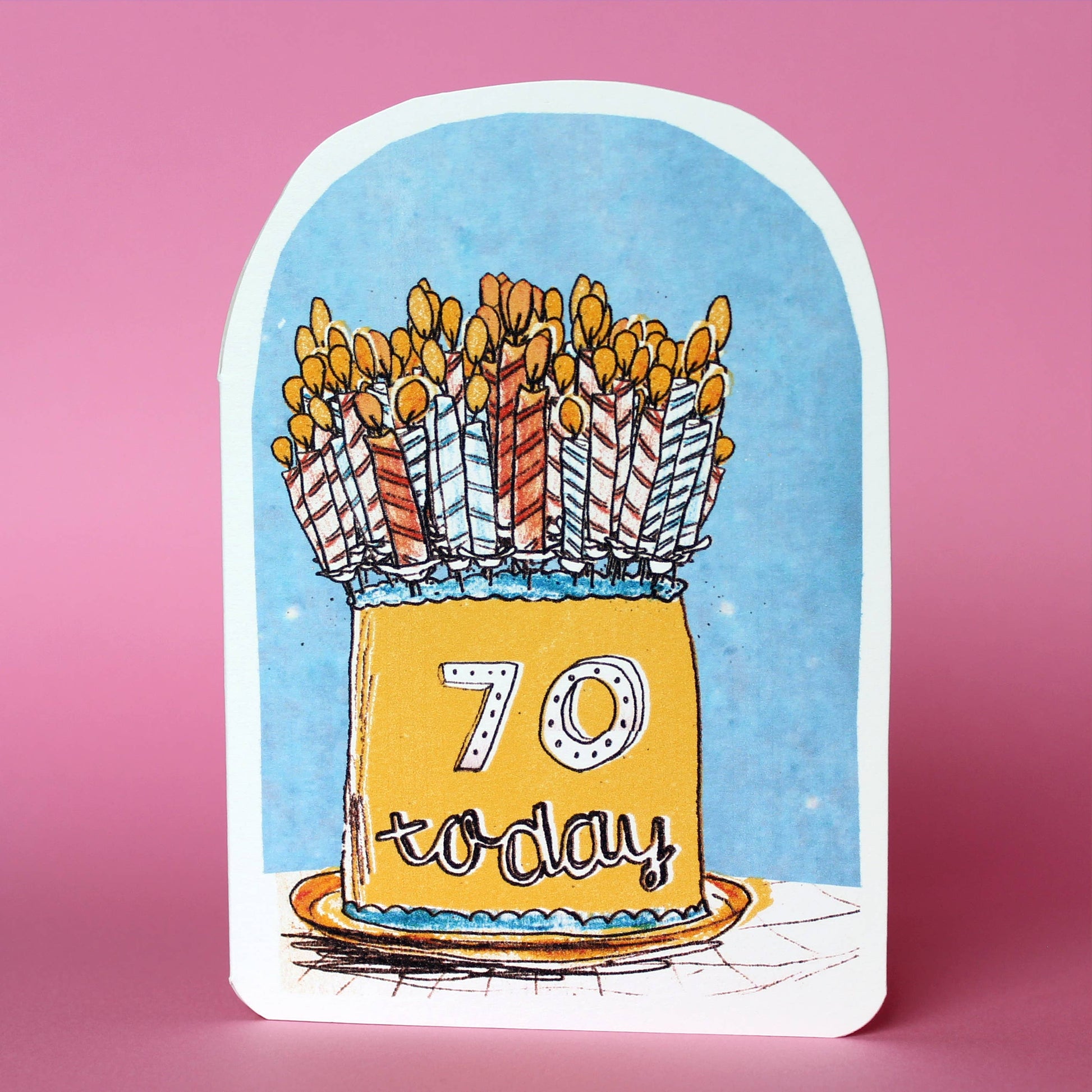 Celebrate seventy years young by blowing out the candles on this yellow birthday cake, making a wish and enjoying this whimsical design by Laura Skillbeck! Oval topped card with a pale blue background and the words 70 today.