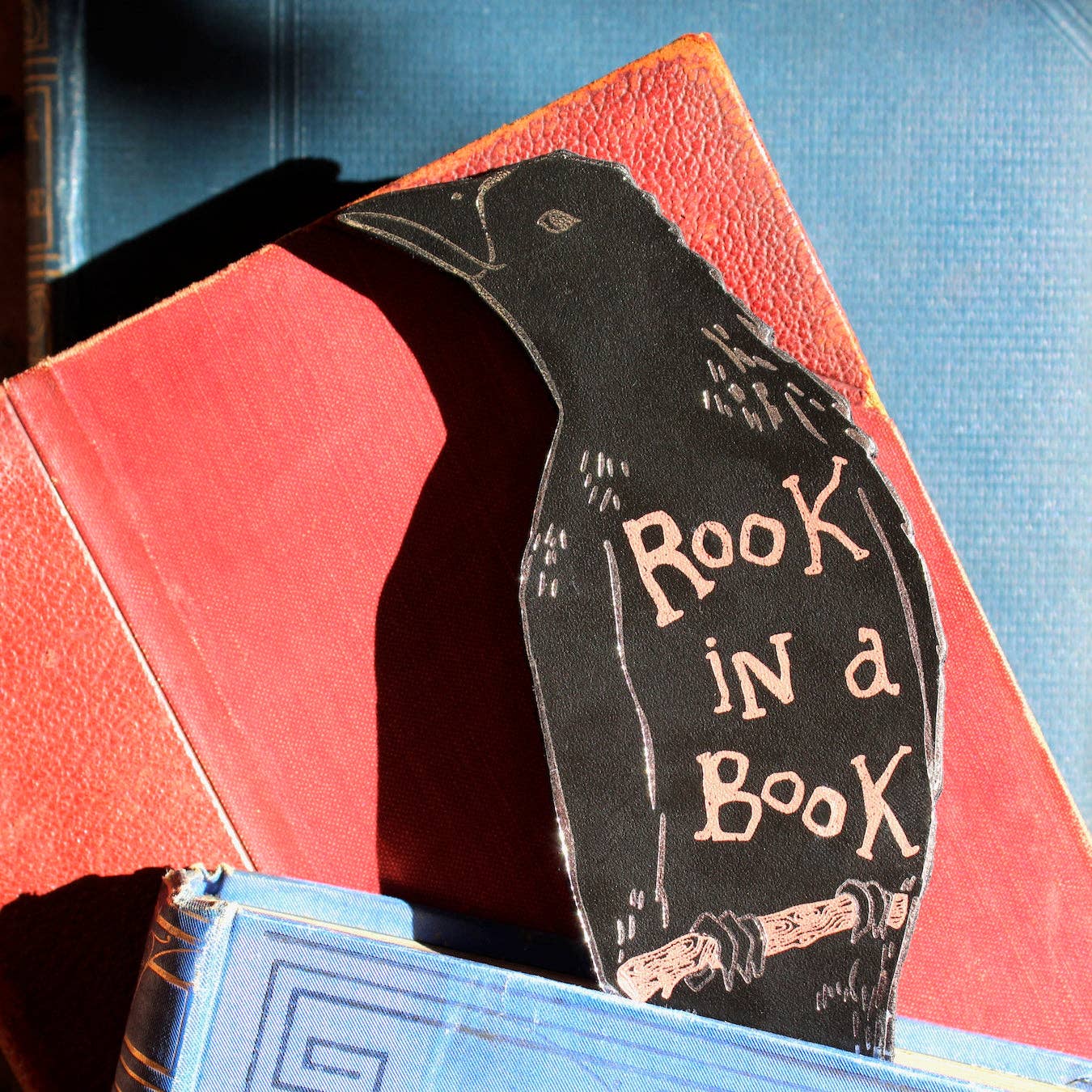 Detail of Silver and Metallic Blue Foil on Bookmark