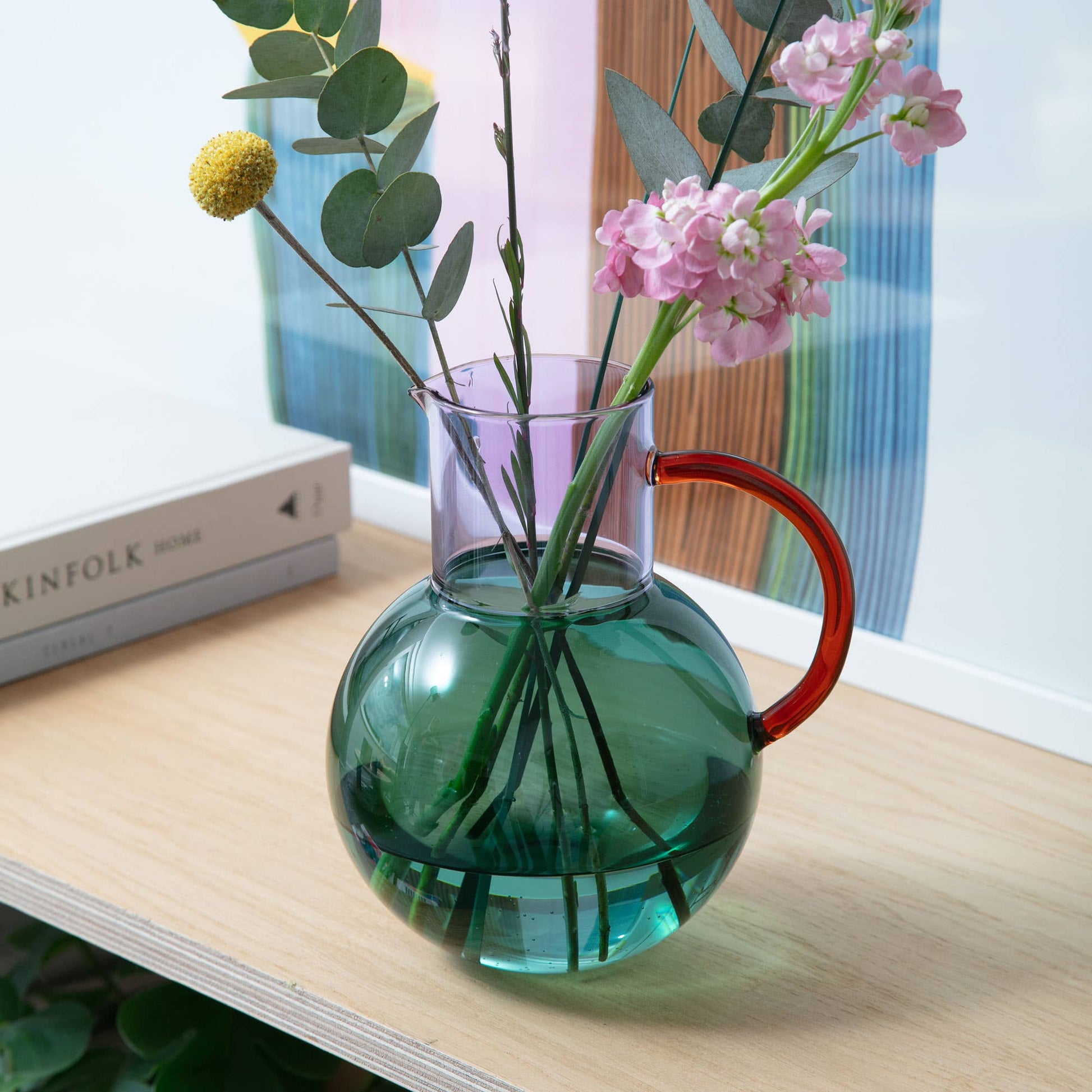 Pablo Large Glass Jug styled as a contemporary vase with flowers