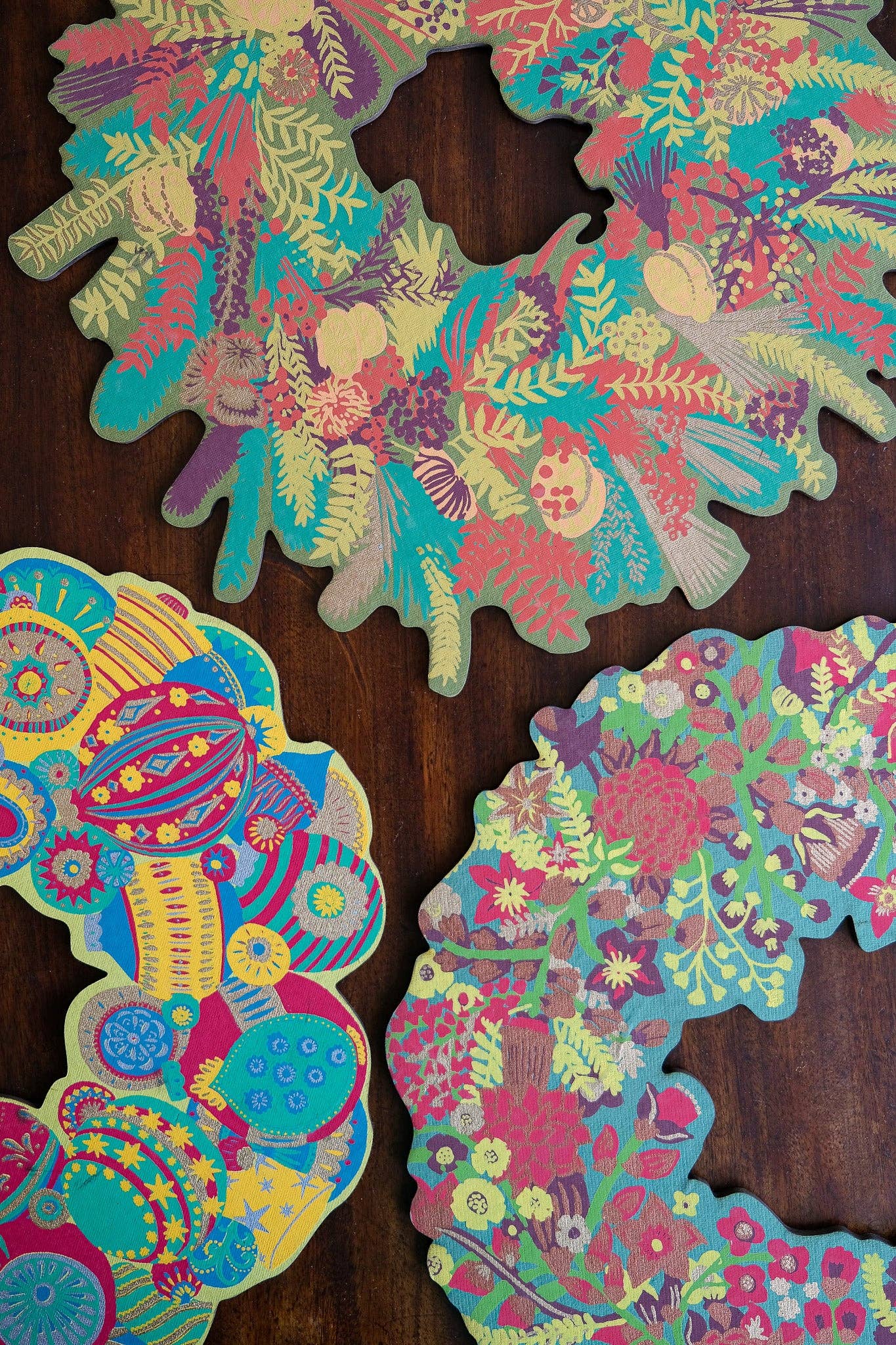Hand-printed cotton board wreath with winter blooms, sustainable Christmas ornament
