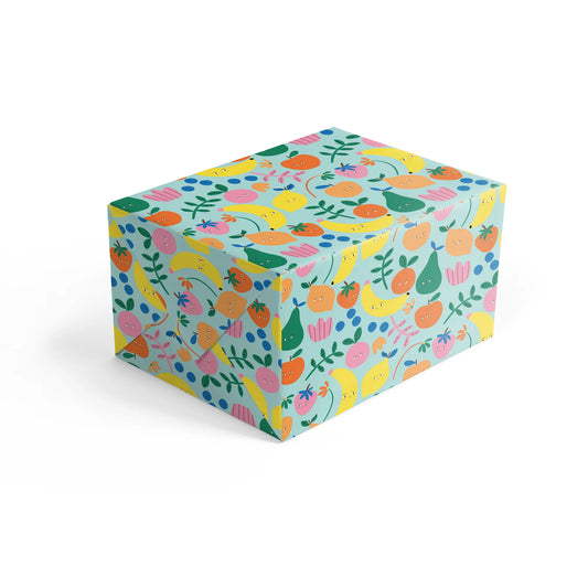 Detail of Fruit Faces eco-friendly gift wrap printed in the UK
