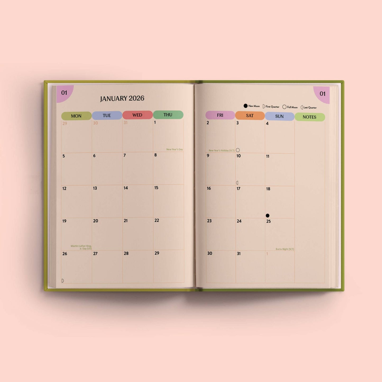 Open calendar showing January 2026 on a pink background