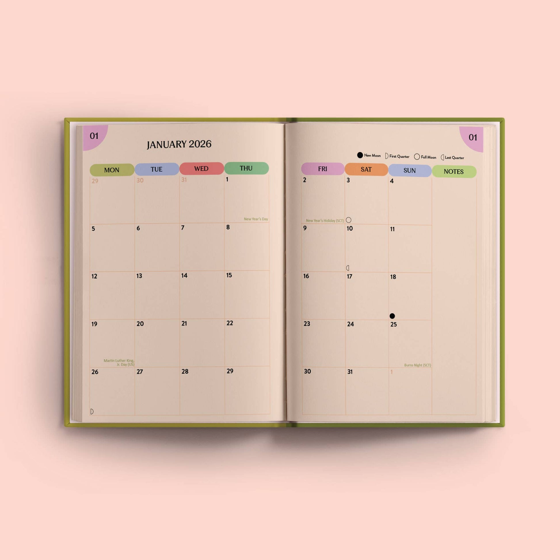 Open calendar showing January 2026 on a pink background