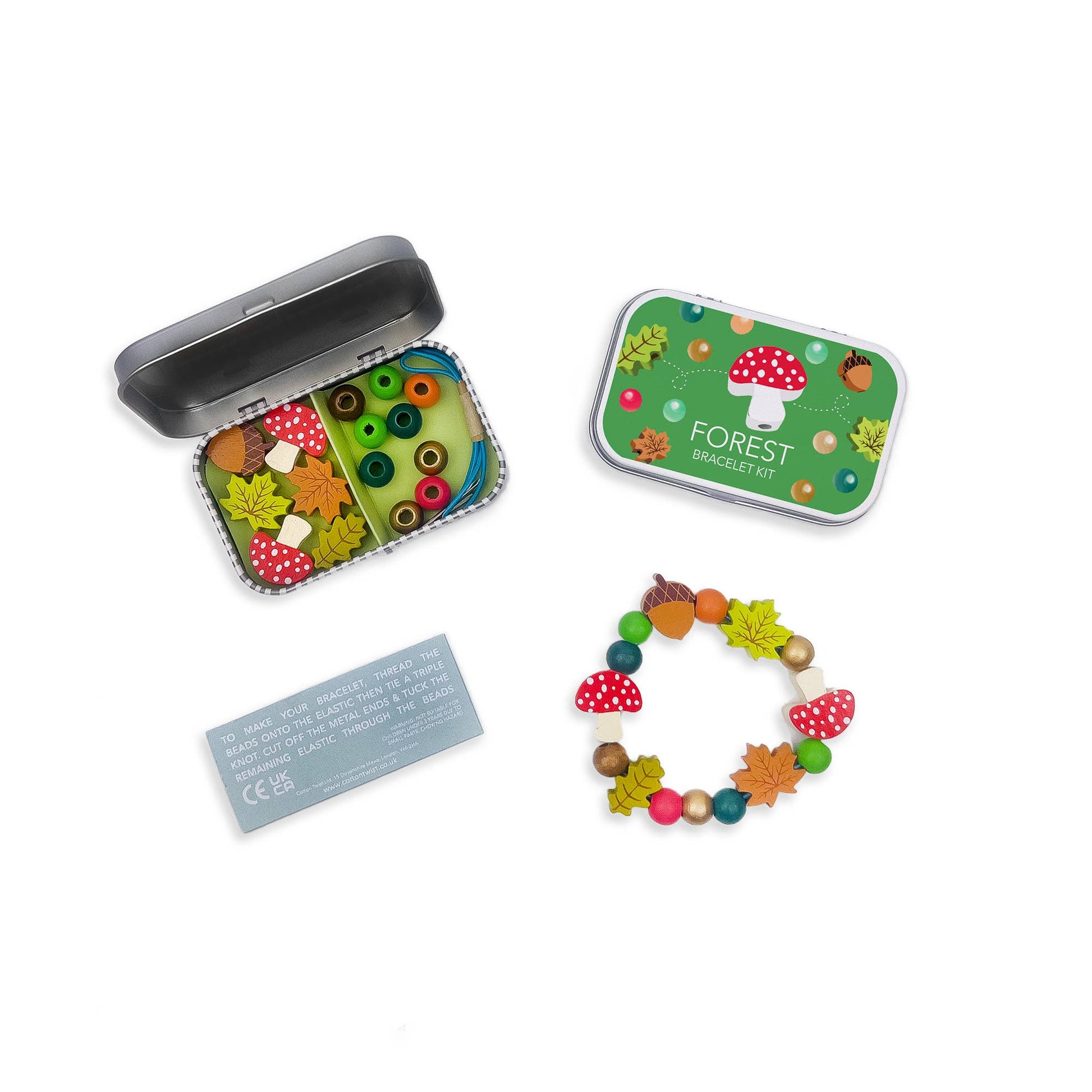 A beautiful gift tin containing elastic &amp; beads to create a beautiful wooden forest-themed bracelet. The elastic comes with metal ends to help children add beads with ease. The tin can be used to store the bracelet, or a special trinket