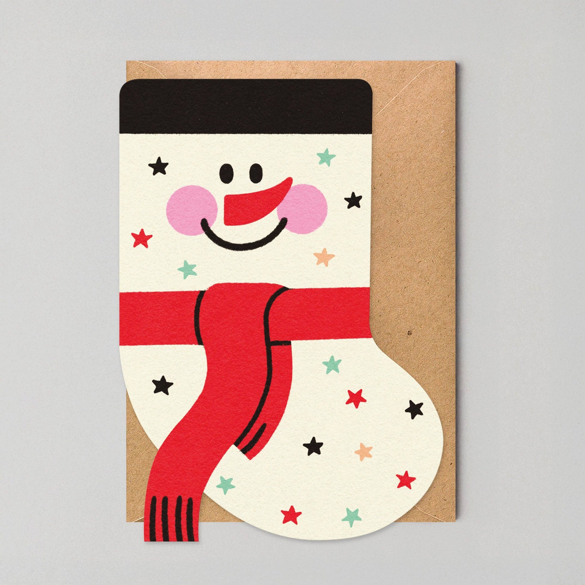 Vibrant die-cut Christmas card featuring a playful snowman stocking design, eco-friendly, plastic-free, made in the UK by Edyta Demurat.