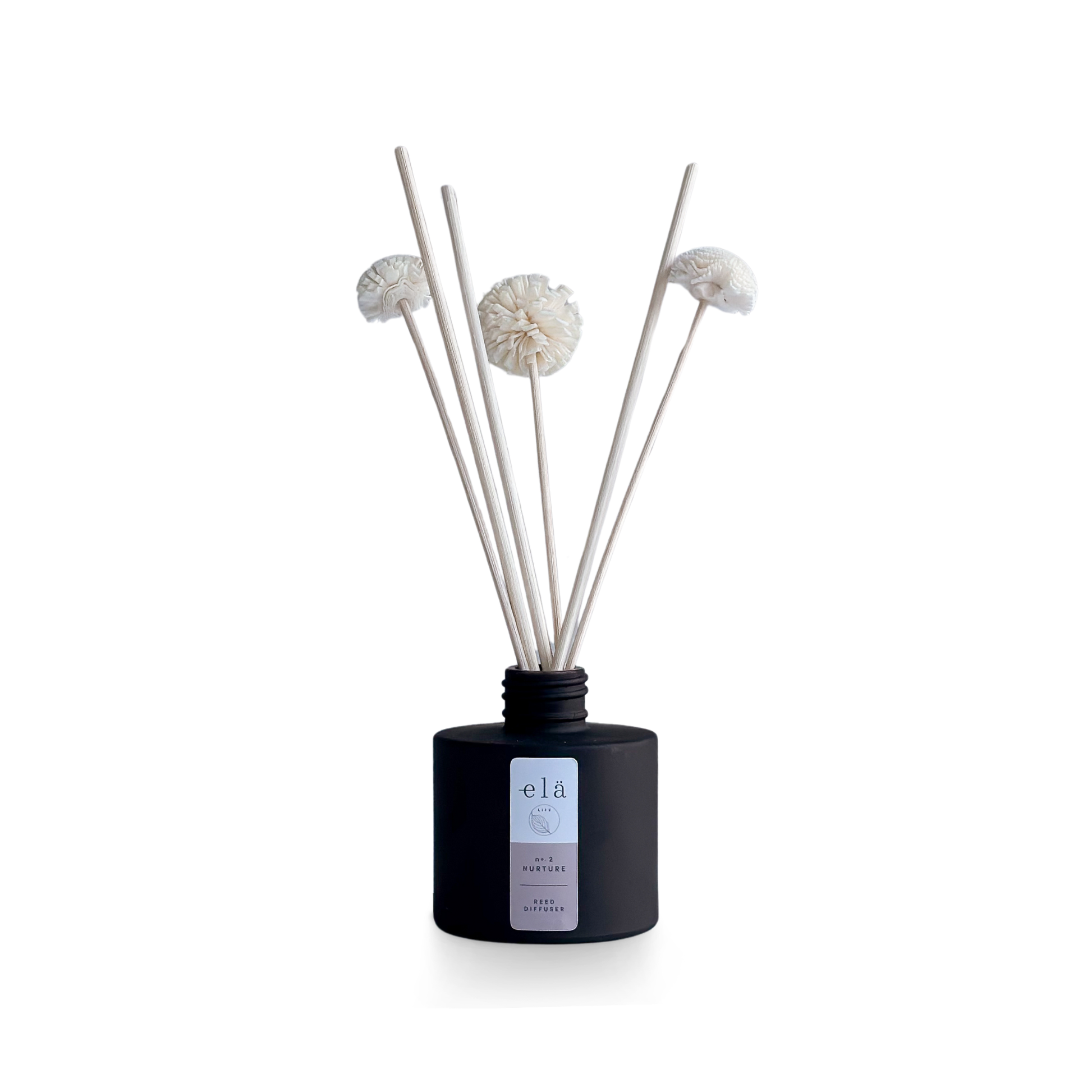 Nurture No 2 Pom Pom Diffuser with sustainably sourced Sola Wood pom poms and essential oils blend fragrance