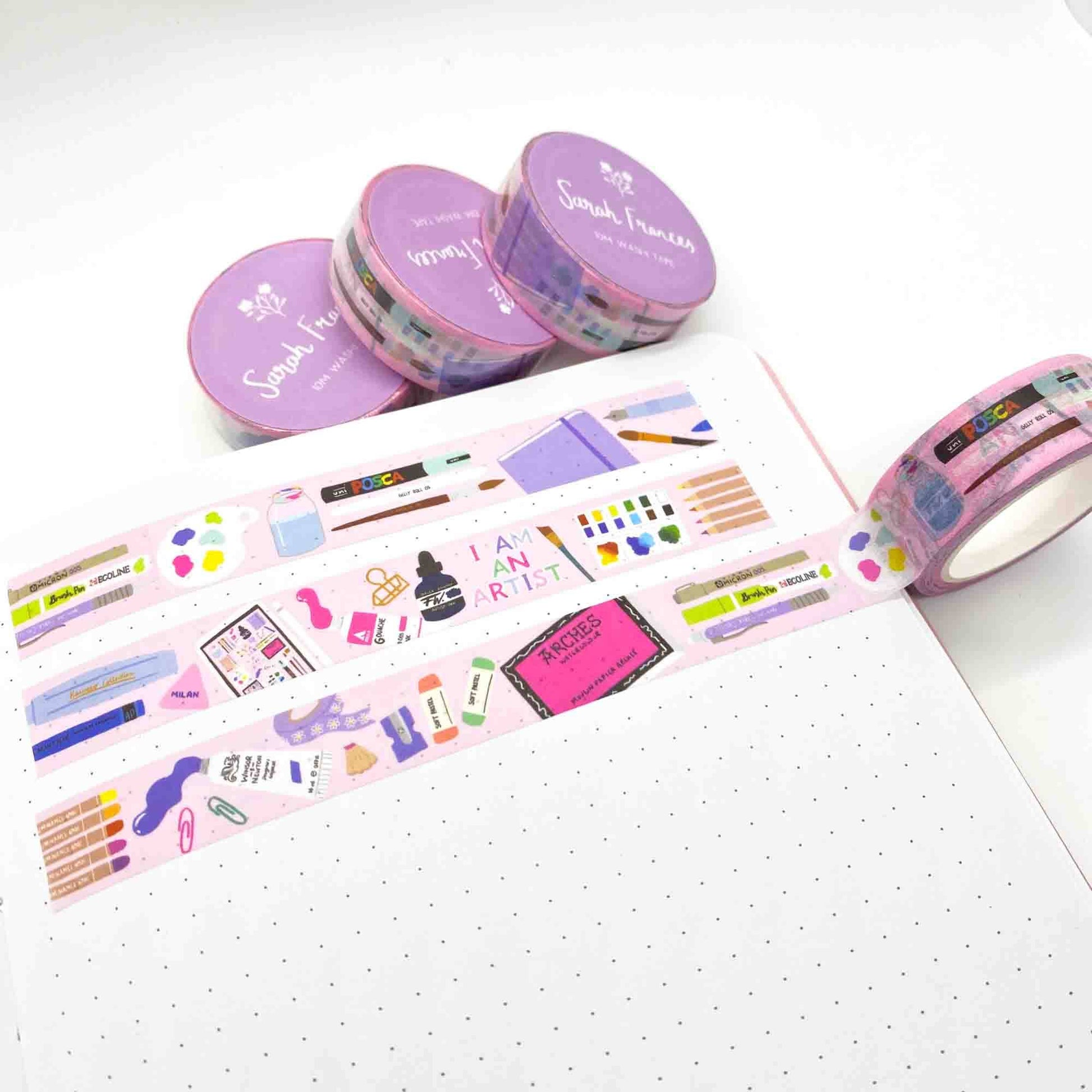 Art Supplies Washi Tape, made in the UK. Pink tape featuring lovely illustrations of painting materials, and stationery. All in bright colours.