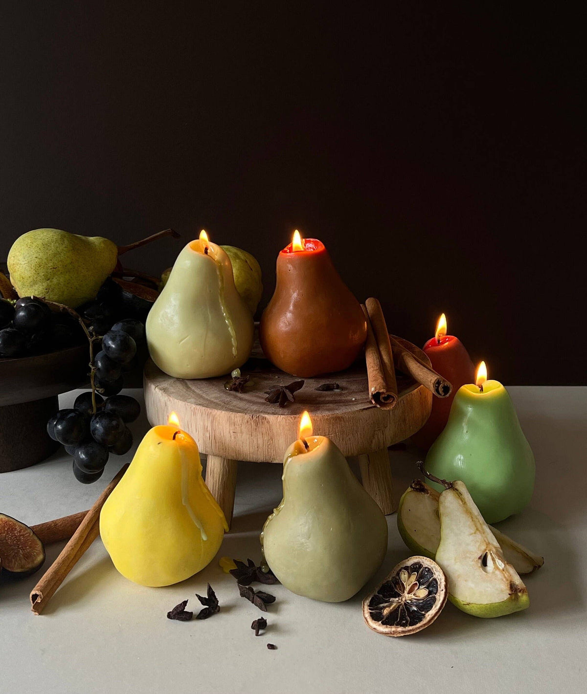 Pear-shaped scented candle in a cosy home setting