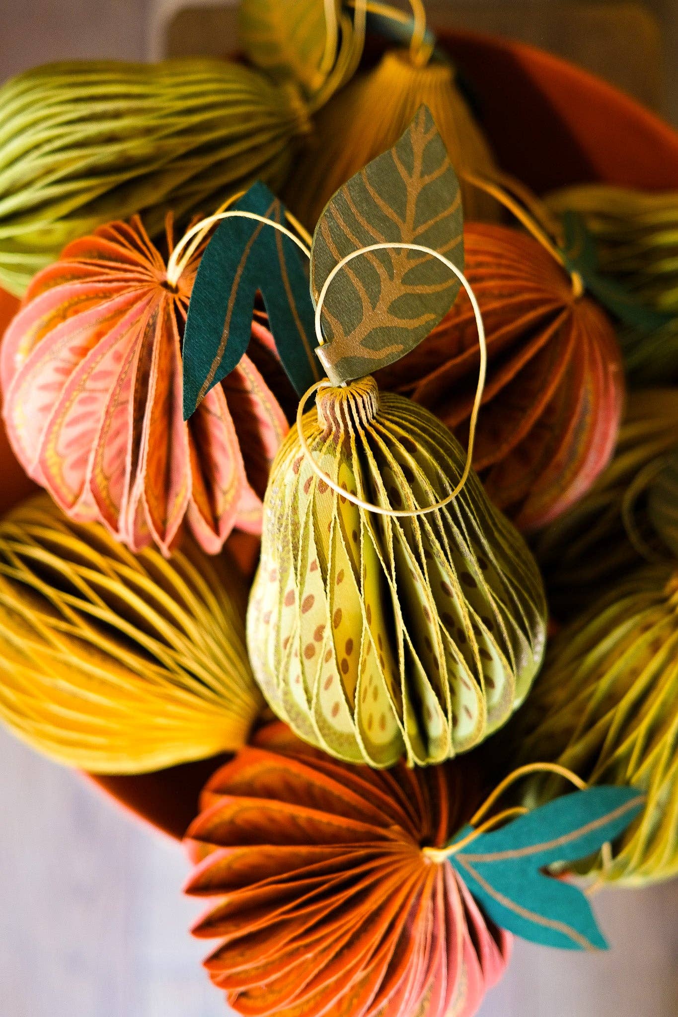 Sustainable pear honeycomb decoration hanging in a bright home interior