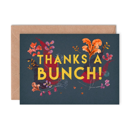 Thanks a bunch in bold capitals in yellow. Thank You greeting card with a simple and colourful illustration of flowers against a black background.