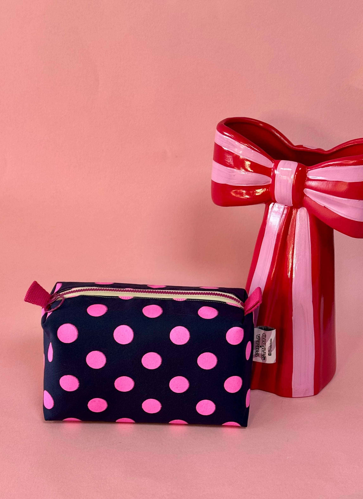 Close up of screen printed dry wax cotton canvas pouch