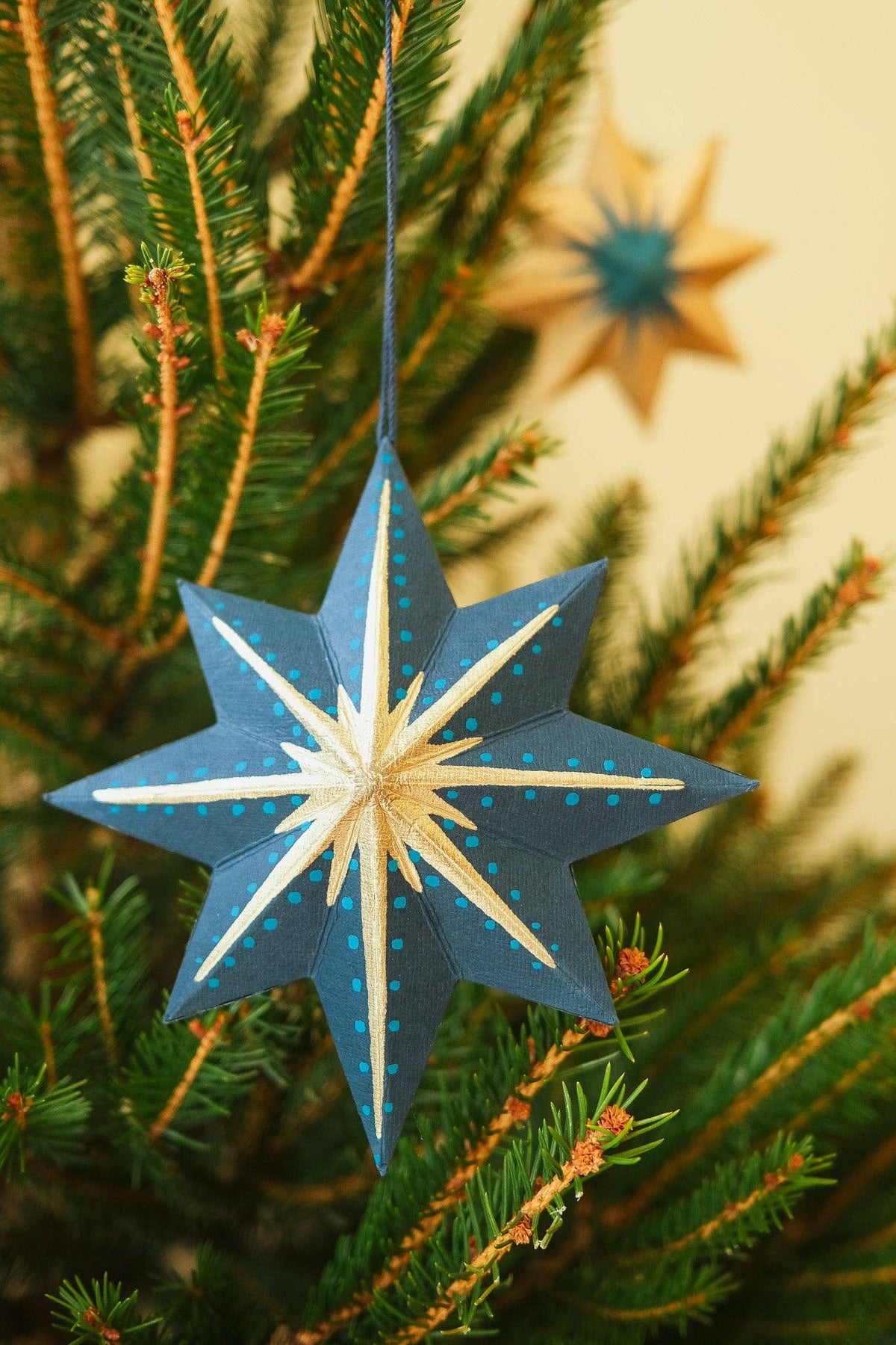 Reverse side of double-sided screen-printed star ornament
