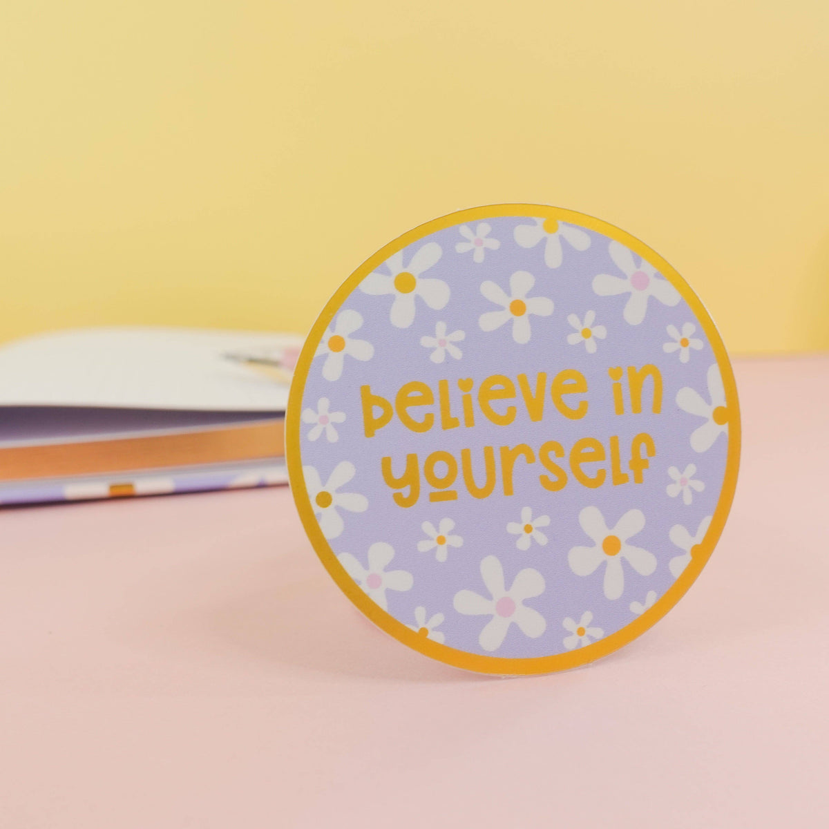 Close up of gold mirror detailing on floral vinyl sticker