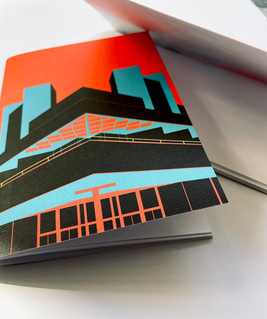 Pocket size brutalist notebooks featuring the Royal Festival Hall from Eye For London. In bold black, red, blue .