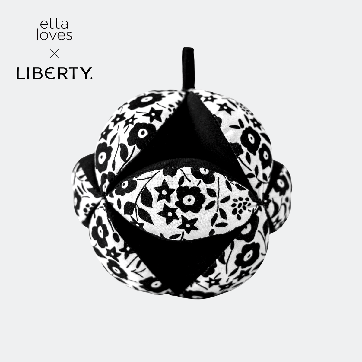 Etta Loves x Liberty sensory grasp ball hanging on baby gym