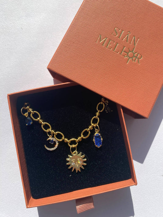 Celestial multi charm gold necklace on a chunky chain