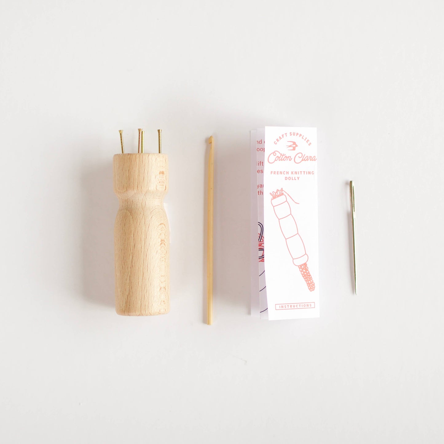 Close up of the wooden knitting dolly craft tool