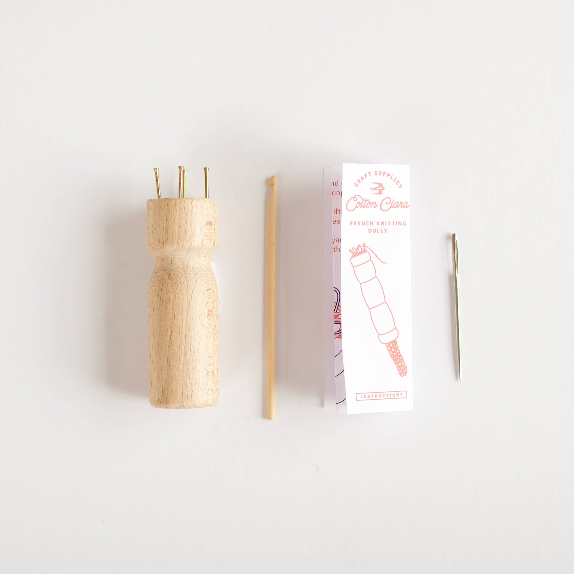 Close up of the wooden knitting dolly craft tool