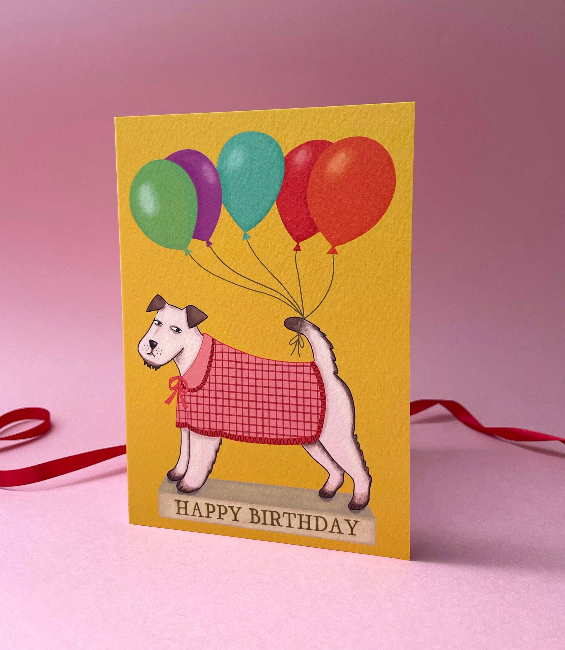 Close up of textured sustainably sourced paper of the dog birthday card