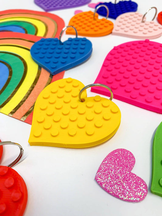 Vibrant assortment of Made Happy eco heart keyrings, ideal sustainable gift