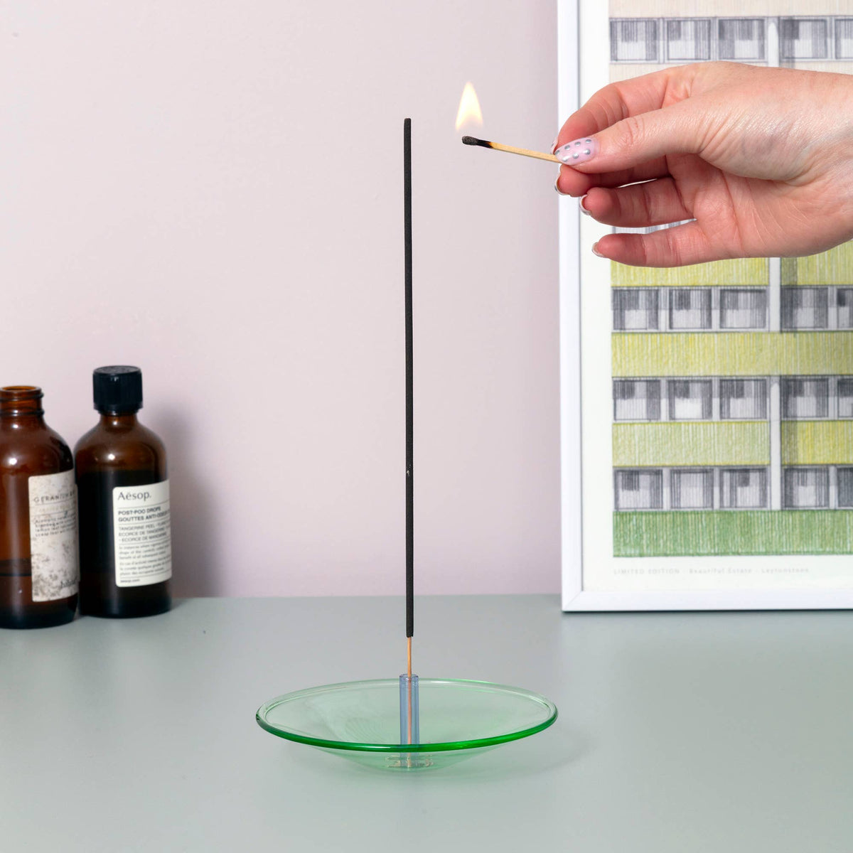Side view of handmade float glass incense burner