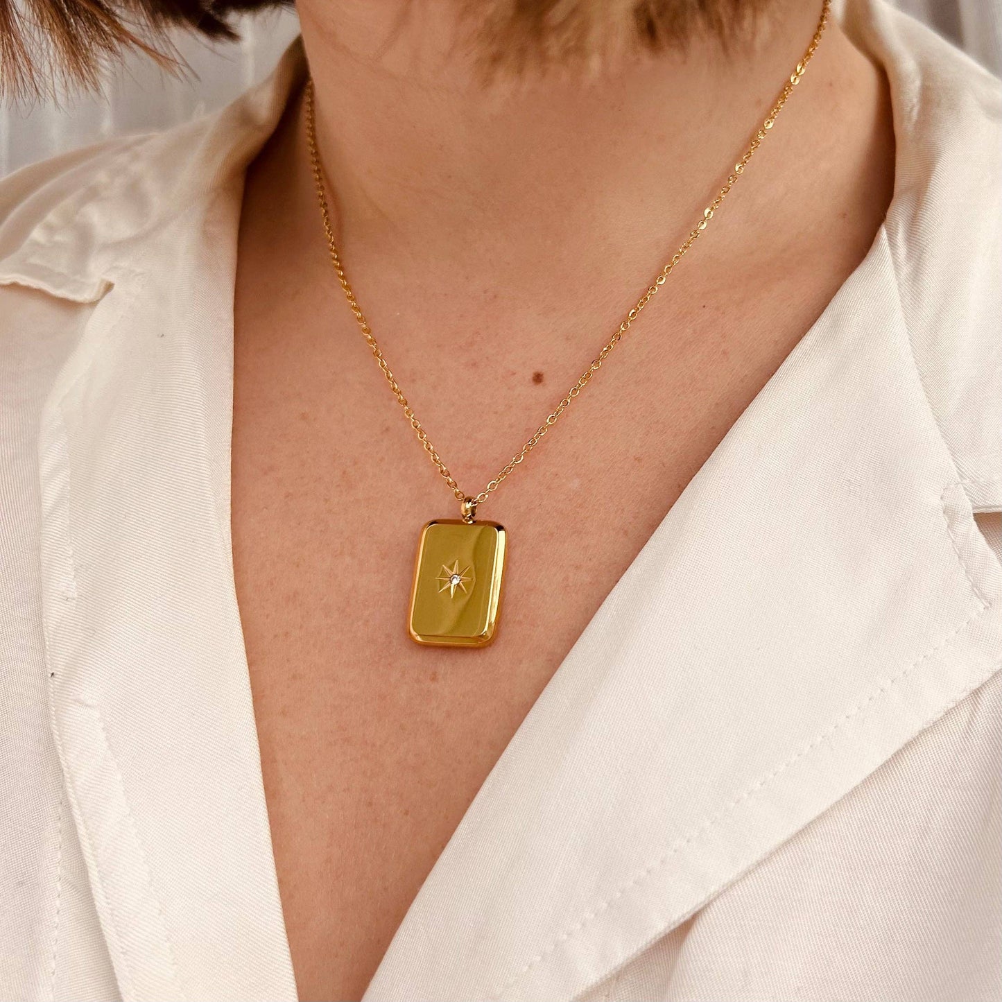 Star Embossed Gold Pendant Necklace in Teardrop Shape