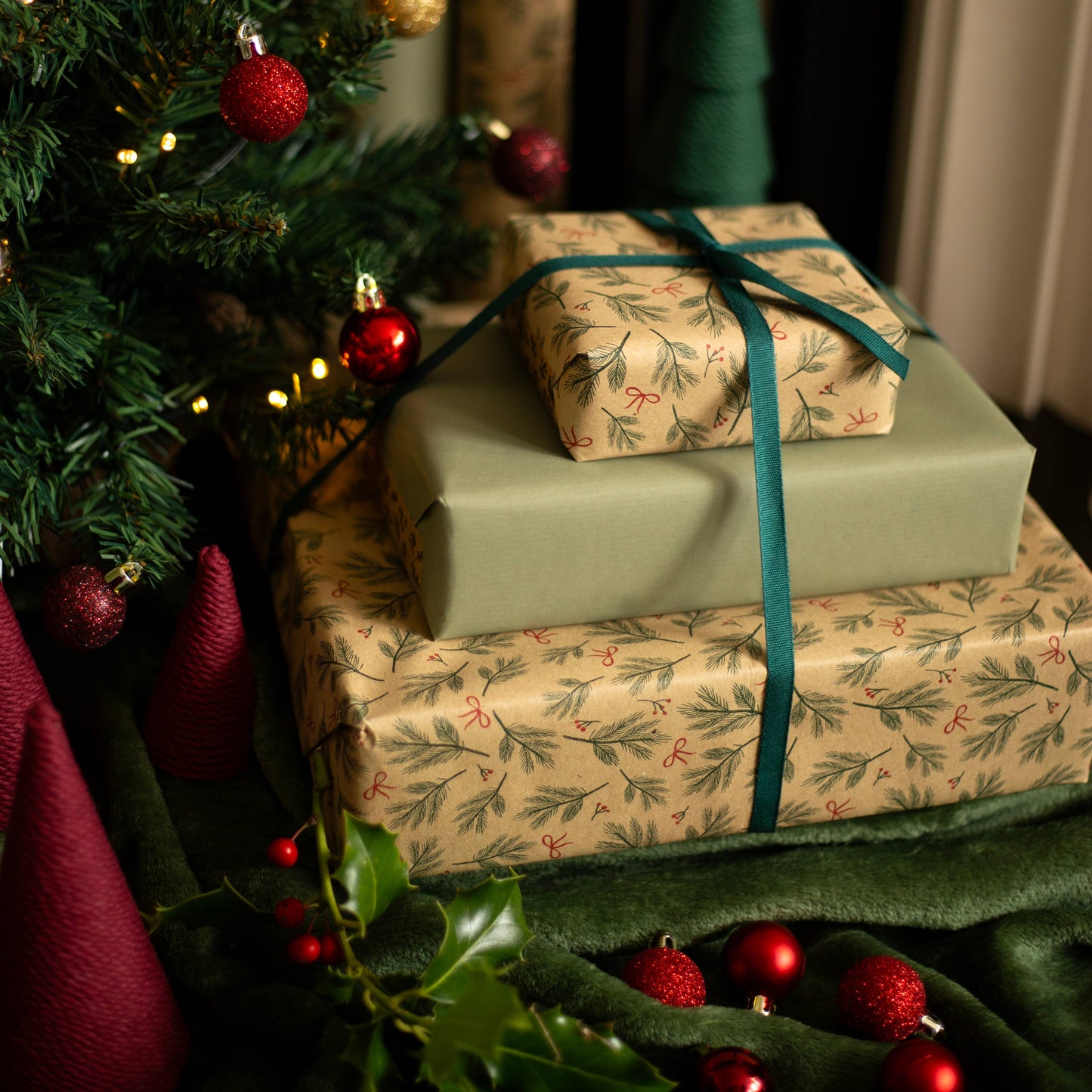 Festive Branches & Bows Christmas Gift Wrap, 5m roll, 500mm wide, 100% recycled brown kraft, eco-friendly sustainable wrapping paper.