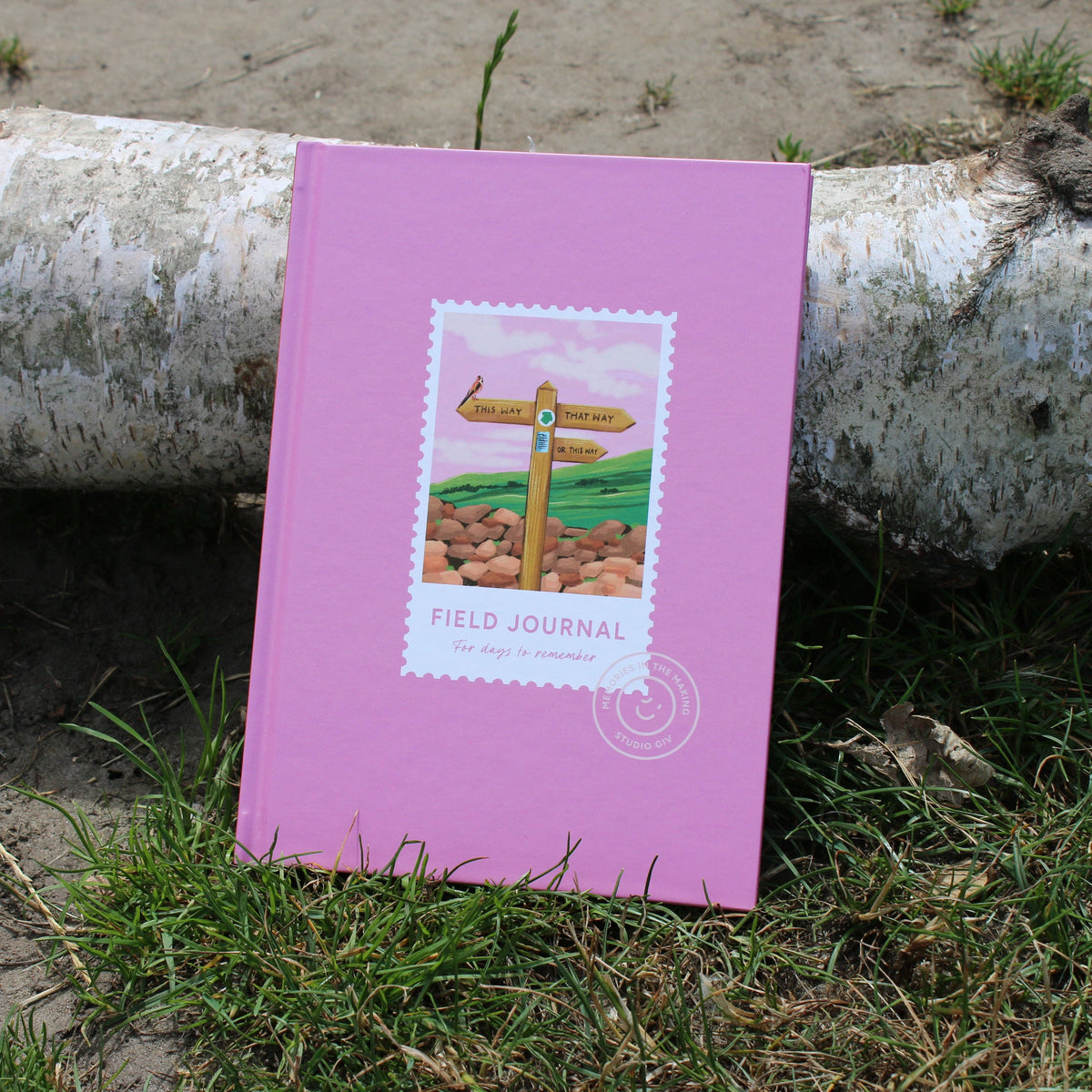 Bullet journal pages inside the hiking logbook for sketching and photos