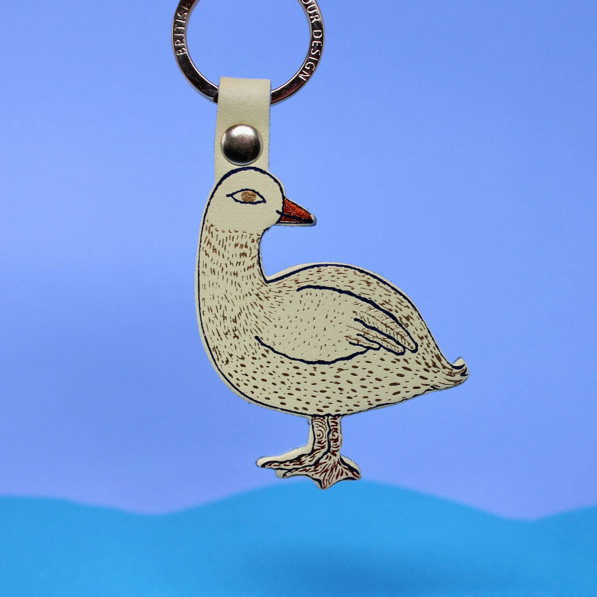 Close-up of gold foil stamped Silly Goose leather keyring