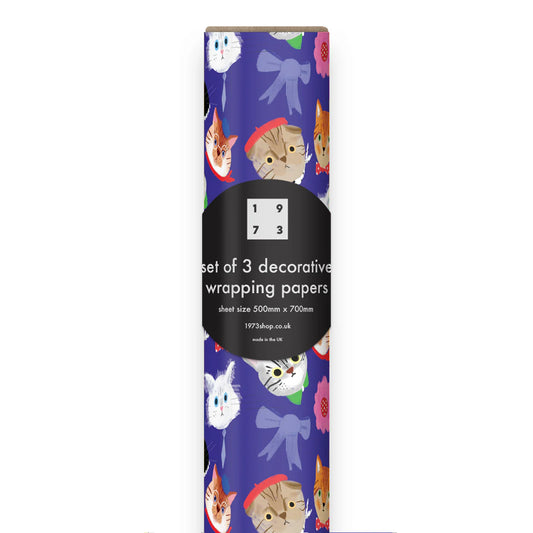 Wrapping paper with cat and bow designs on a purple background. Roll of 3 recycled sheets. Plastic Free.