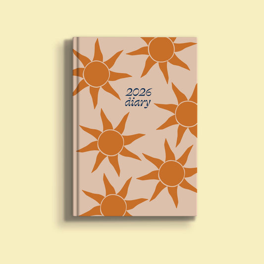 2026 A5 Sunbeam Weekly Planner by Good Tuesday—bold peach and golden cover with sun rays, hardback, recycled paper, UK made, ribbon marker.