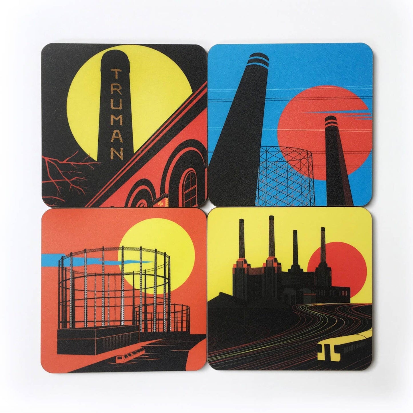 Industrial London Coaster Gift Set. Set of 4 coasters featuring London Landmarks. Battersea, Hackney, Croydon and Brick Lane Gasholders and chimneys. The gritty, not so pretty side of industrial London. Featuring the Battersea Power station, the gasworks at Waddon Marsh Croydon, the chimney of the Old Truman Brewery, and the gas holders by the canal in Hackney, as seen from an overground train. 