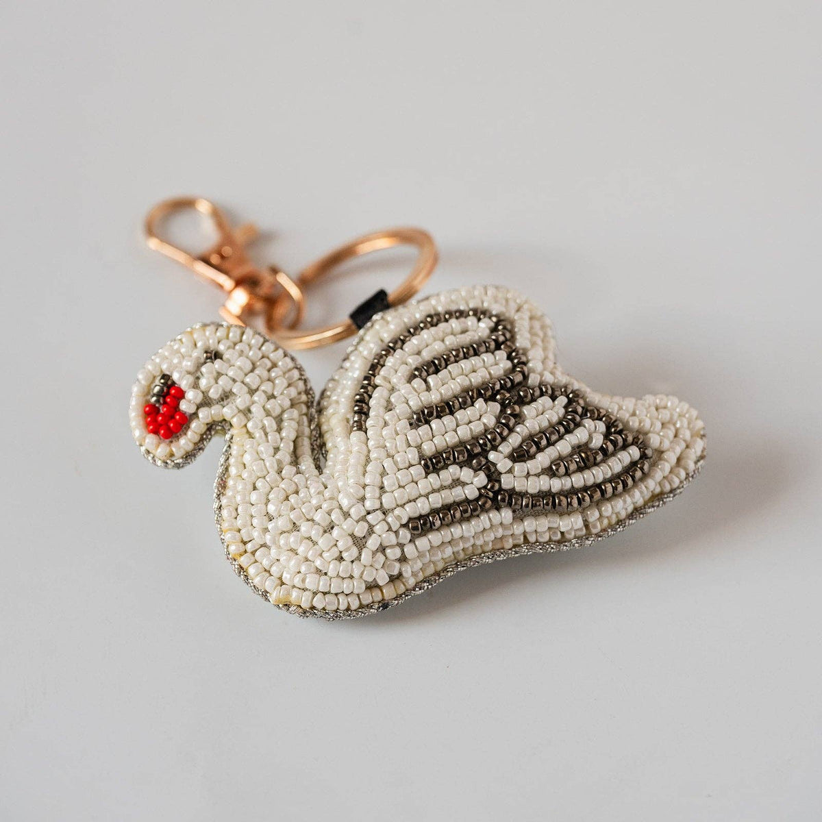 Playful beaded strawberry doughnut keyring