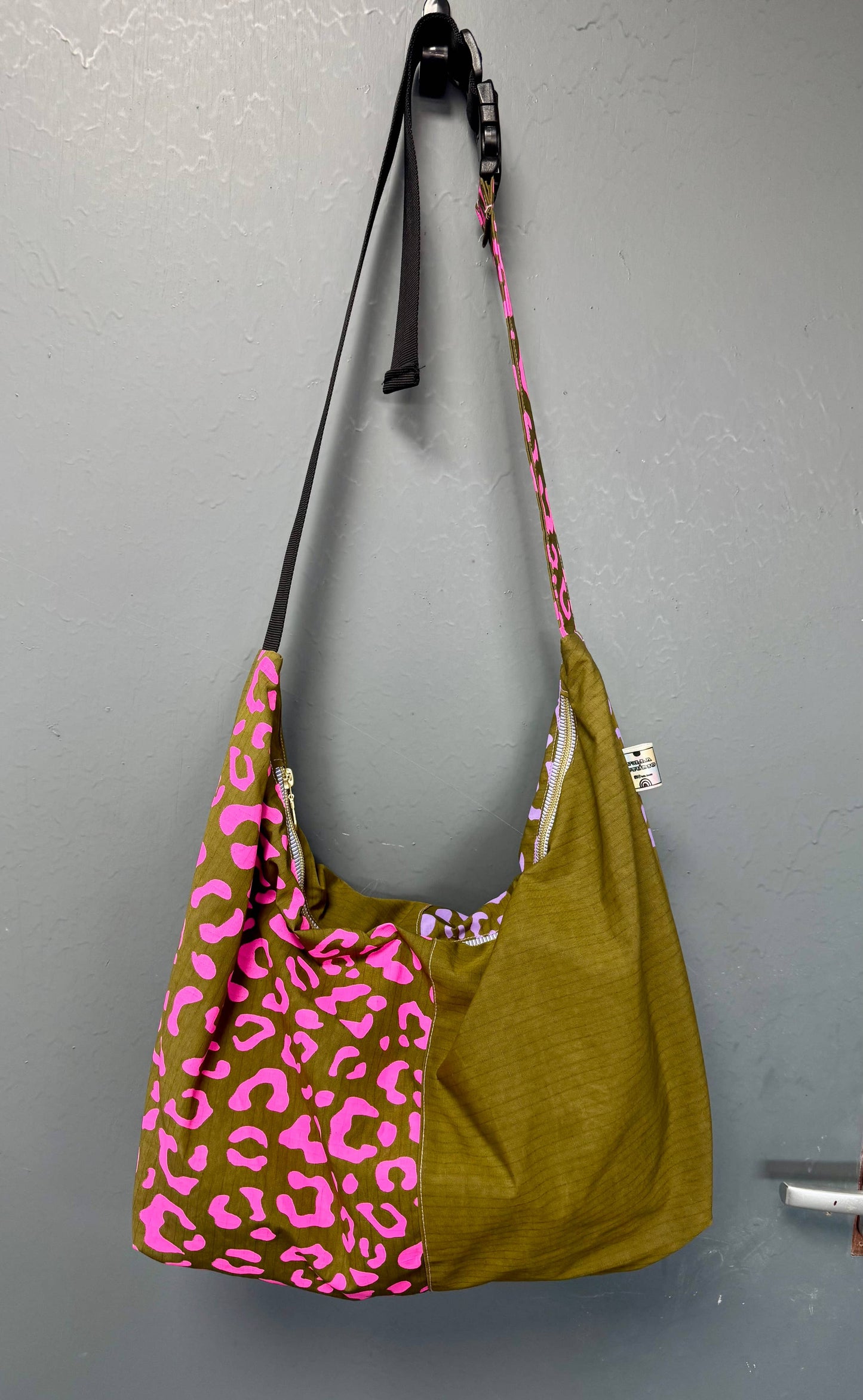 Yolla Studio Leopard Print Shopper Bag worn slouchy over shoulder, showcasing versatility.
