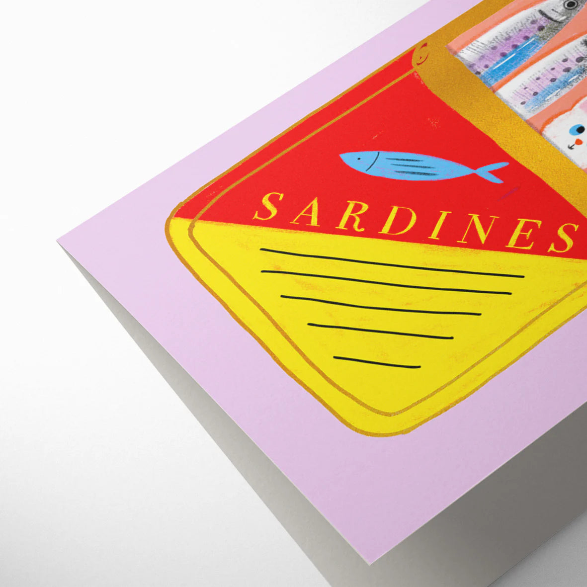 Illustration of a sardine can with fish and a cat on a pink background. Tinned Fish birthday card illustrated by Carolyn Suzuki, featuring sardine can with cat, litho printed with gold foiling and kraft envelope, size 108mm x 140mm.