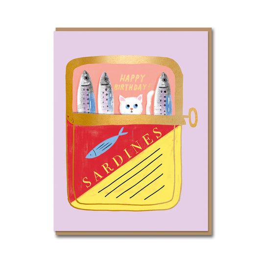 Illustration of a sardine can with fish and a cat on a pink background. Tinned Fish birthday card illustrated by Carolyn Suzuki, featuring sardine can with cat, litho printed with gold foiling and kraft envelope, size 108mm x 140mm.
