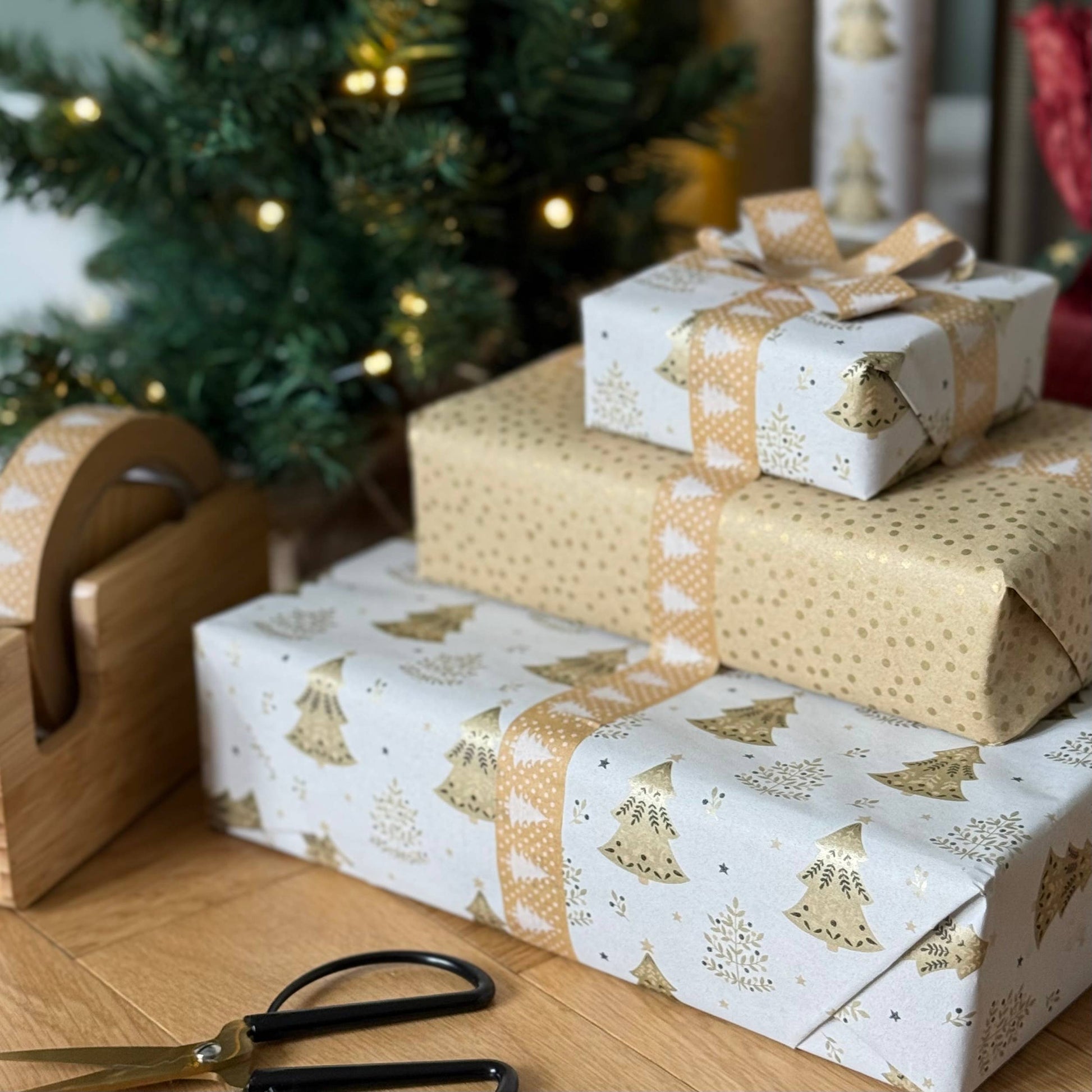 Gold Christmas Trees Festive Gift Wrap, 5m roll, 500mm wide, brown kraft with gold tree design, sustainable eco-friendly Christmas wrapping paper.