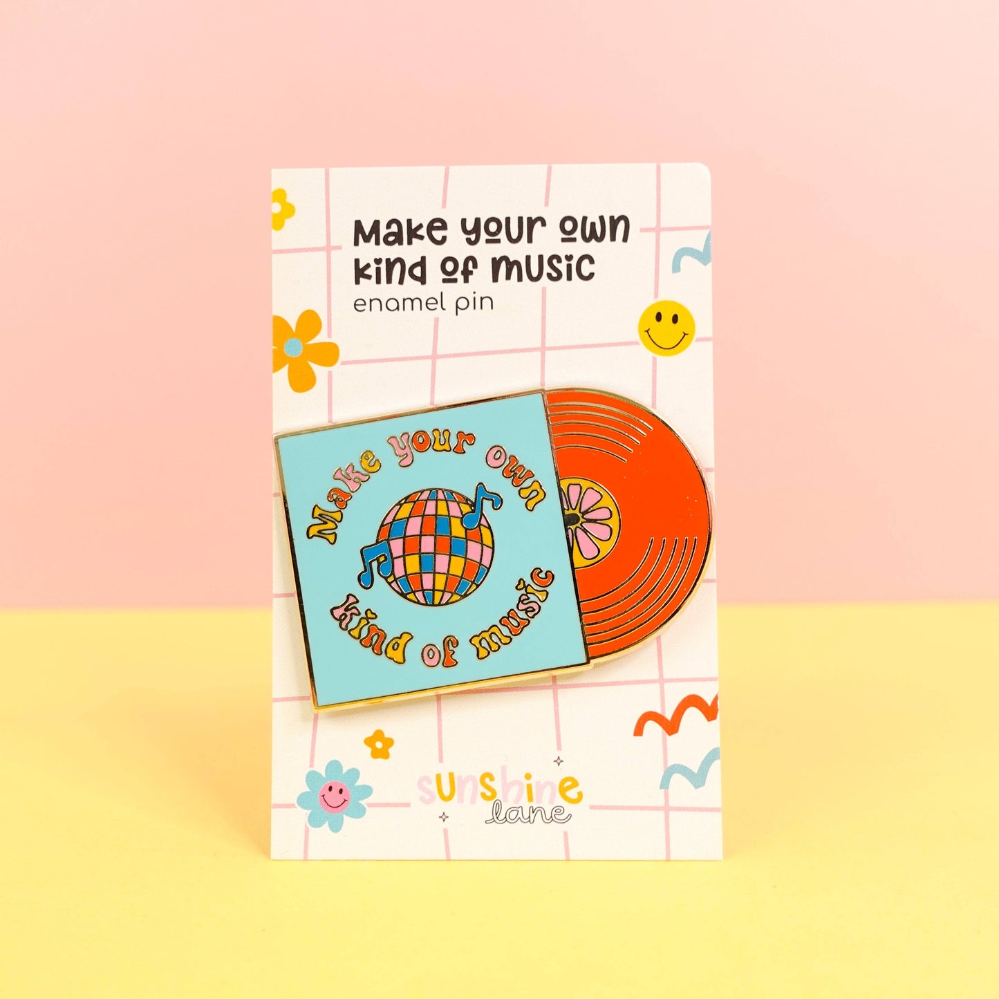 Retro vinyl record and disco ball enamel pin with ‘Make Your Own Kind of Music’ quote, gold hard enamel