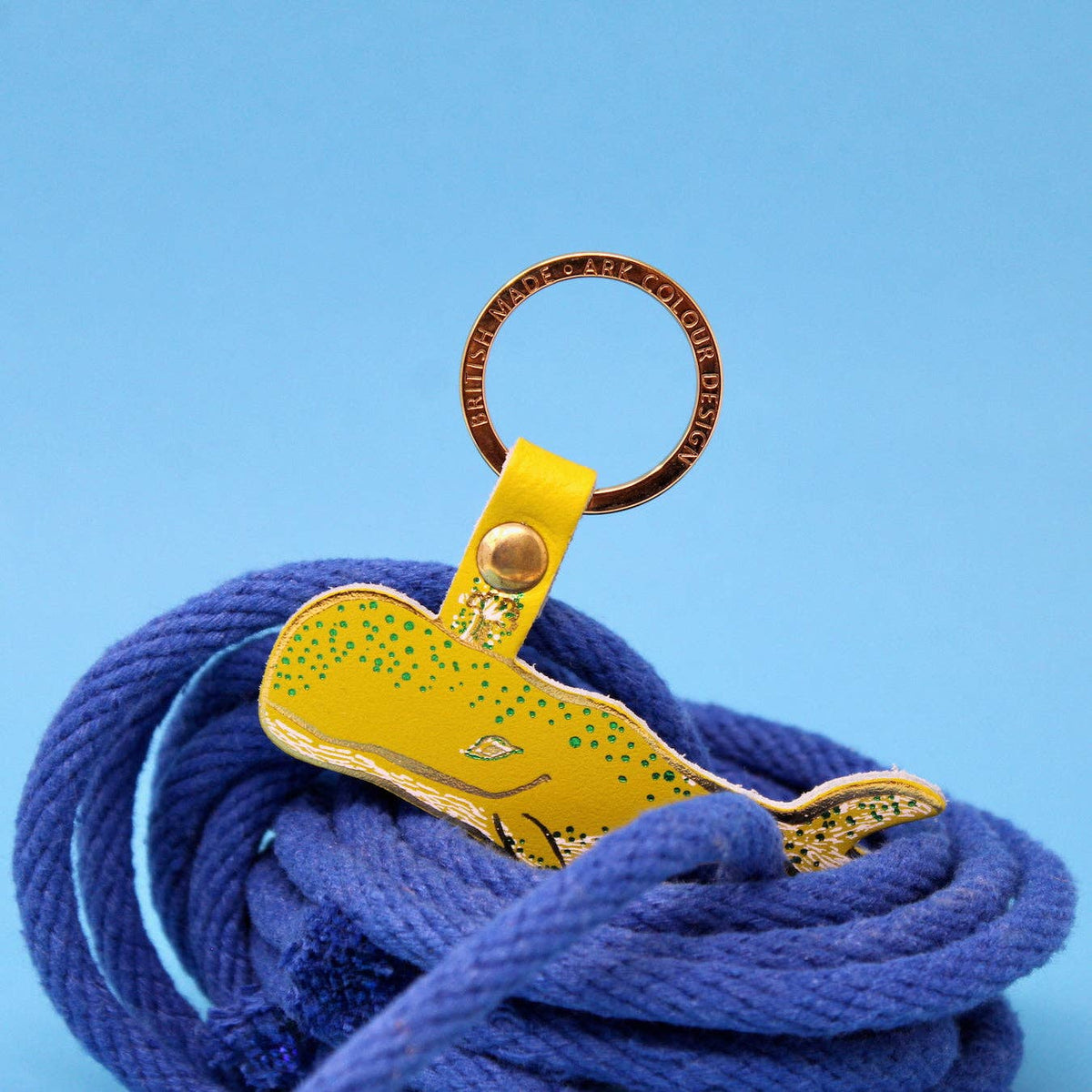 Leather humpback whale keychain shown from top view