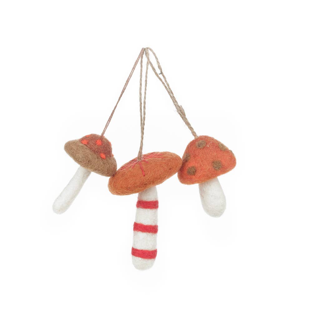 Close up of needle felted details on wild mushrooms