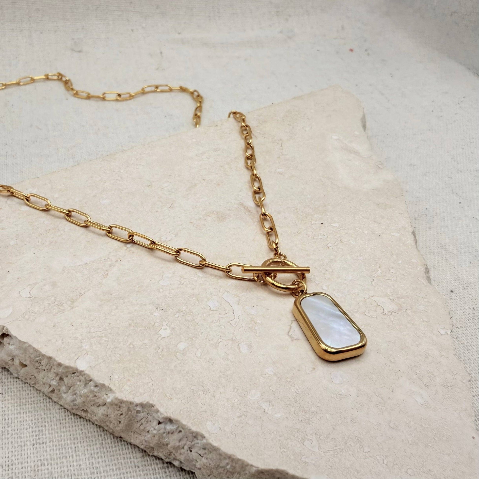 Close-up of iridescent Mother of Pearl pendant