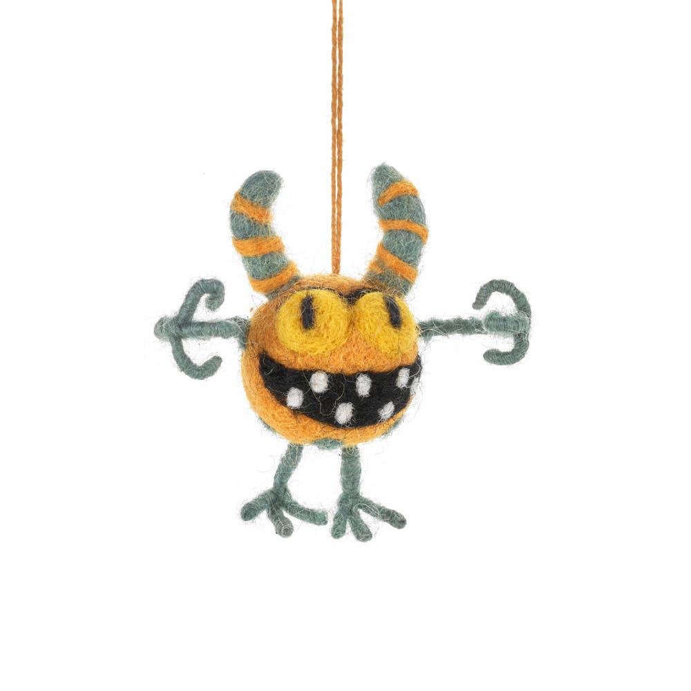 Detail of needle felted monster decoration with poseable arms