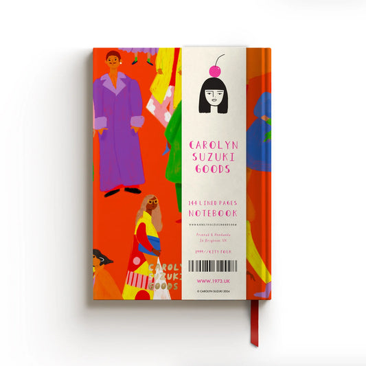 A playful tone meets practical design in this Carolyn Suzuki Notebook: a case bound, lay-flat binding notebook with 144 lined pages, luxurious 120gsm off white paper, a laminated cover, and a matching ribbon bookmark.