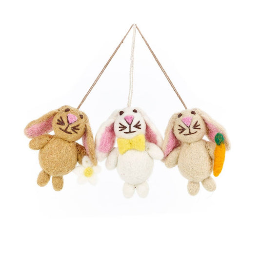 Add some adorable Mini Easter Bunnies to your egg hunt this year with our set of 3 Mini Bunnies. This charming trio come with their own mini wet felted daisy and carrot and are made using traditional needle felting techniques by our skilled Nepalese artisans.

They're made from 100% sustainable New Zealand wool and are completely plastic free!