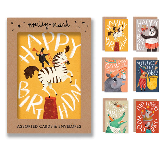 Set of six assorted circus animal greeting cards by Emily Nash, printed on sustainably certified matte card with recycled kraft envelopes, in a cardboard gift box.