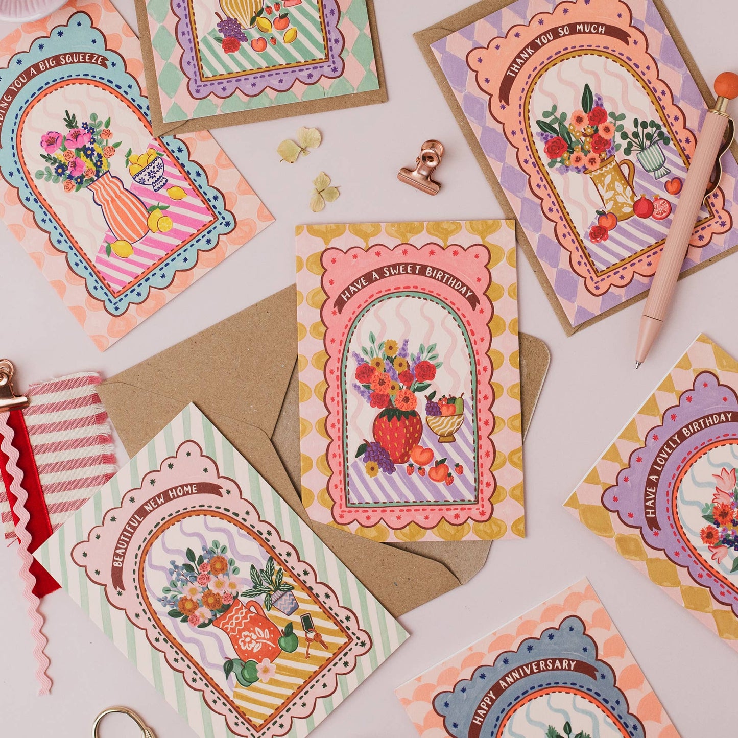 Detailed view of 'Beautiful New Home' hand lettering on maximalist greeting card