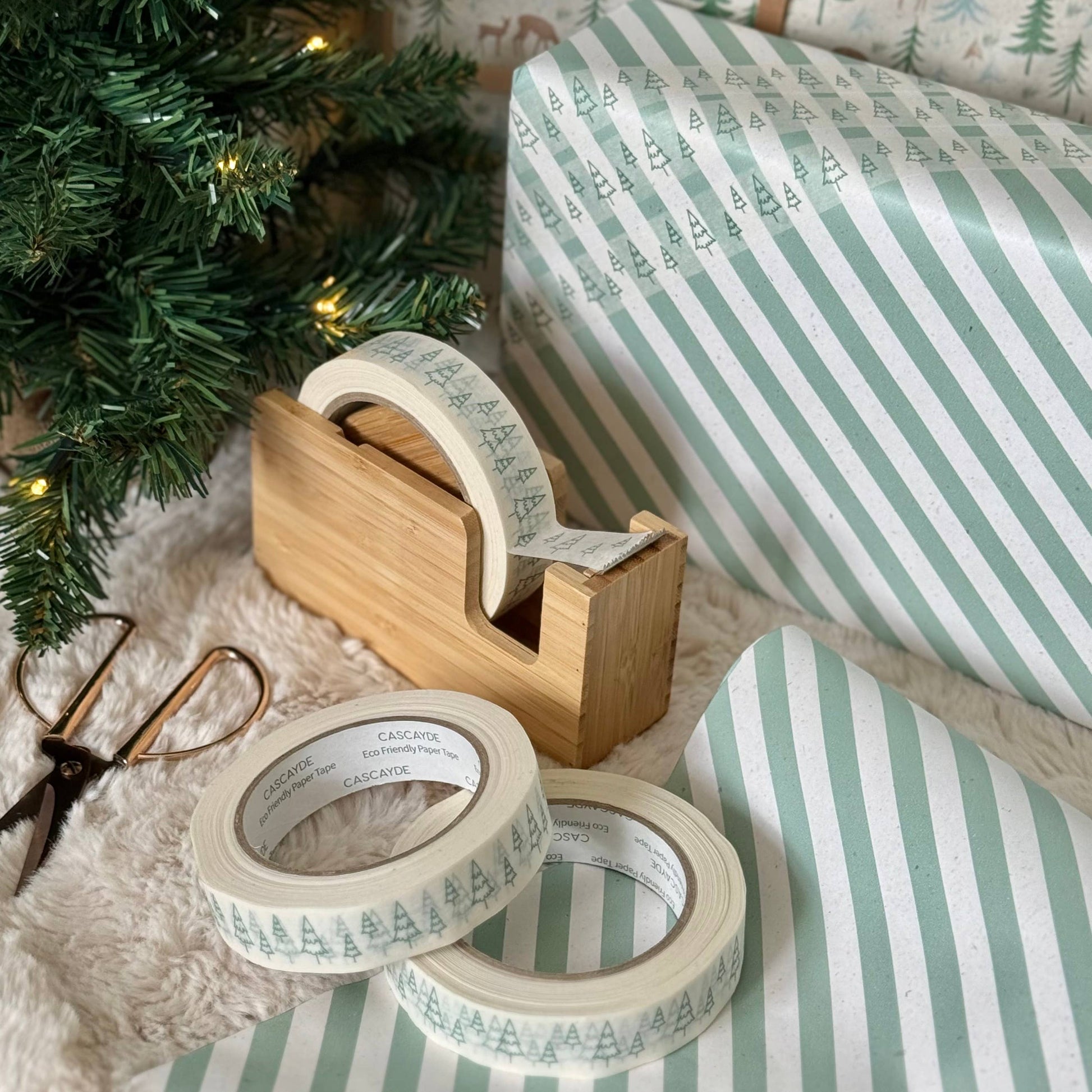 Green Christmas Tree Paper Tape on white kraft, 24mm x 50m, vegan ink, plant-based adhesive, plastic-free recyclable gift wrap tape