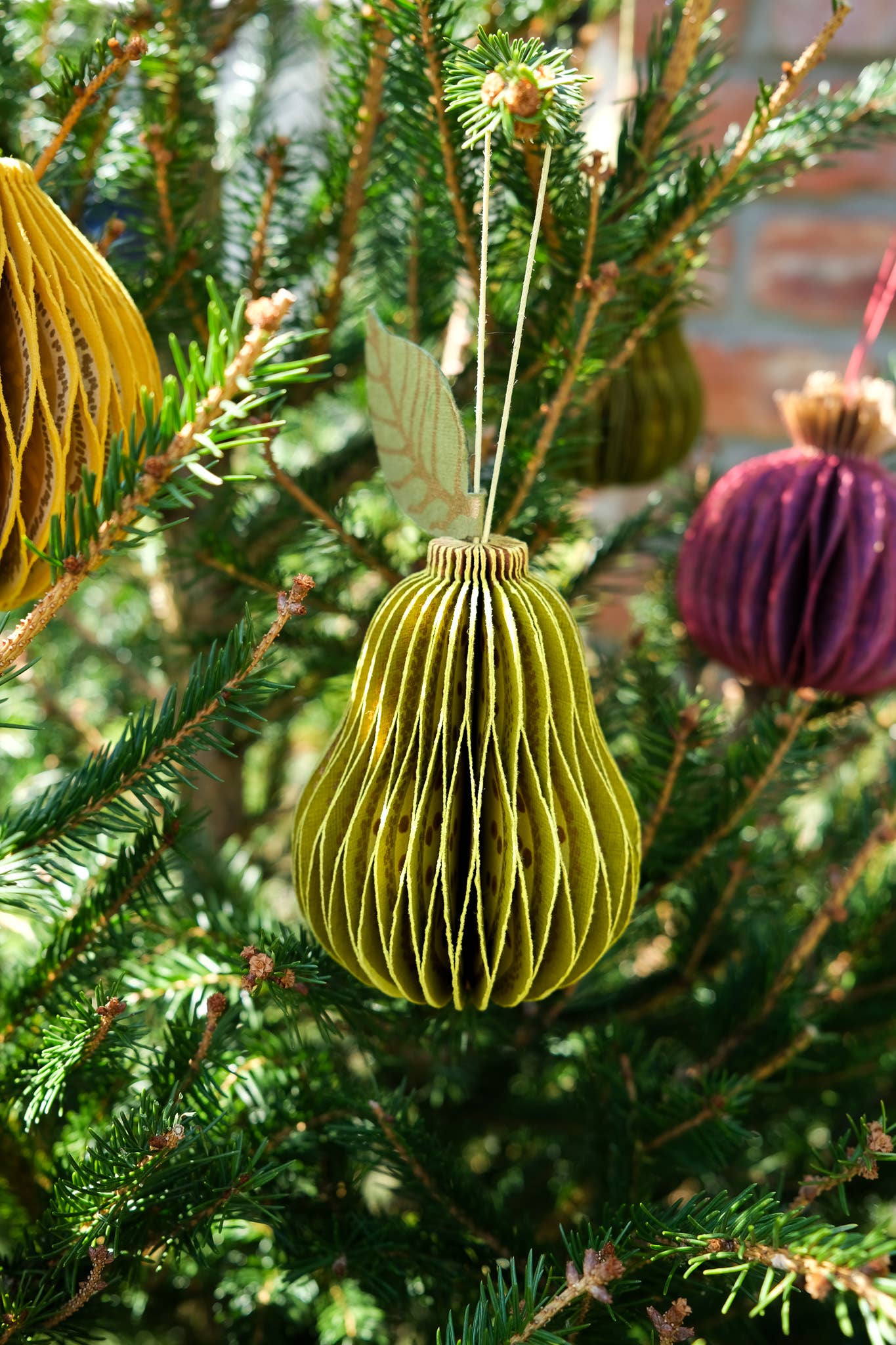 Eco-friendly pear honeycomb ornament enhancing a modern home aesthetic